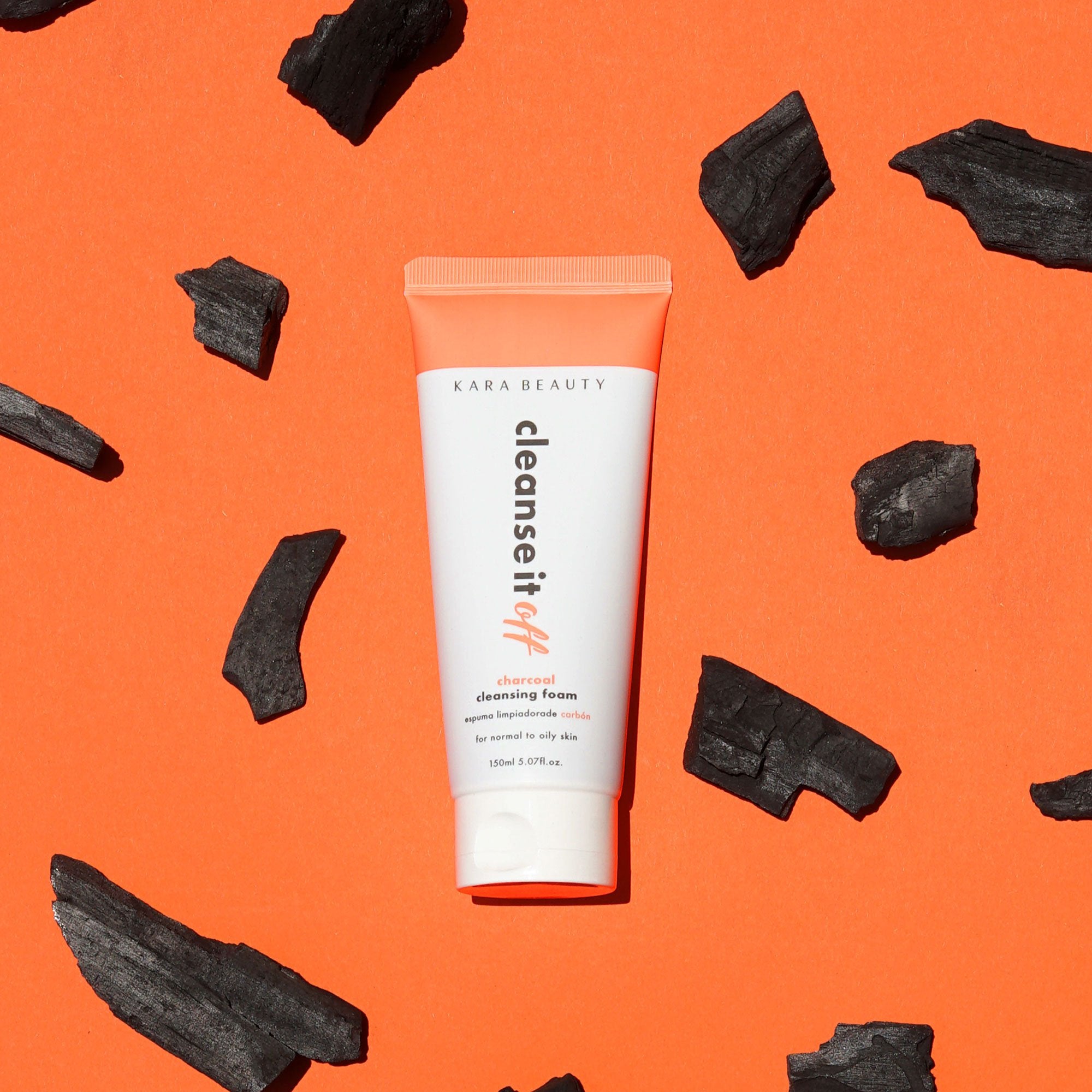 Cleanse it Off charcoal vegan facial cleansing foam with props