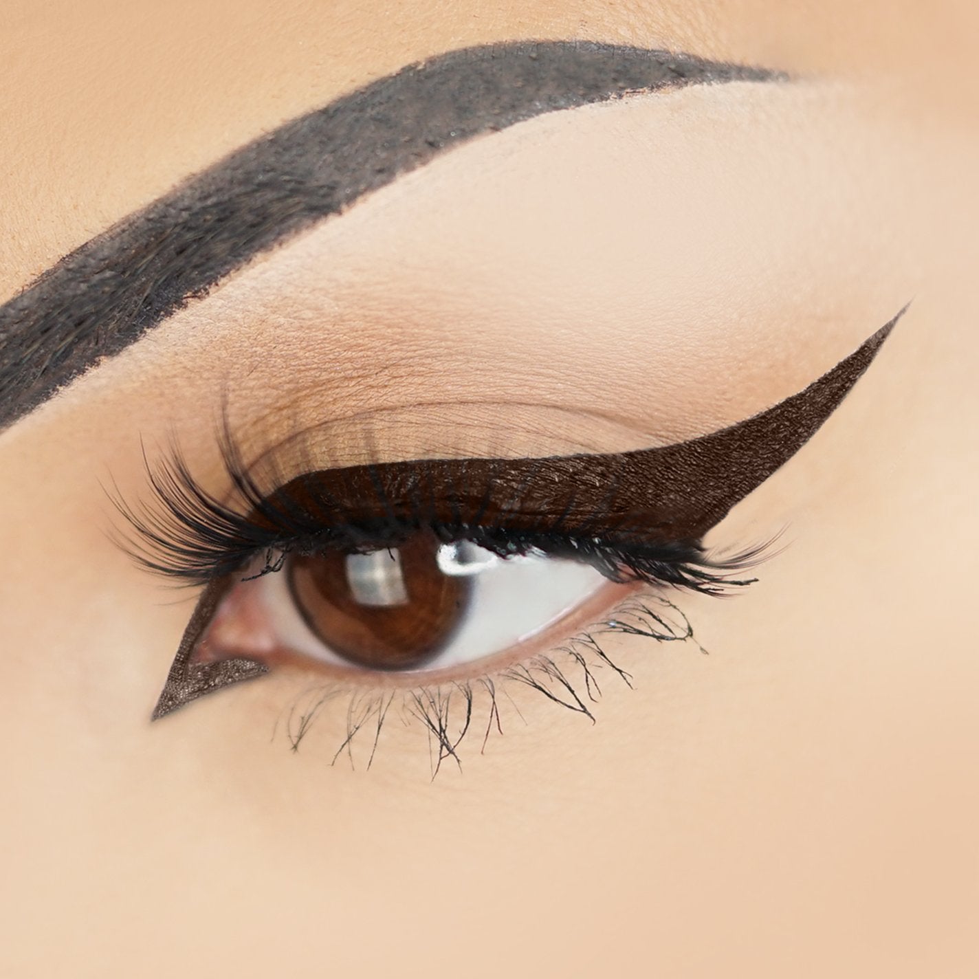 Kara Beauty Brown waterproof vegan liquid eyeliner on model