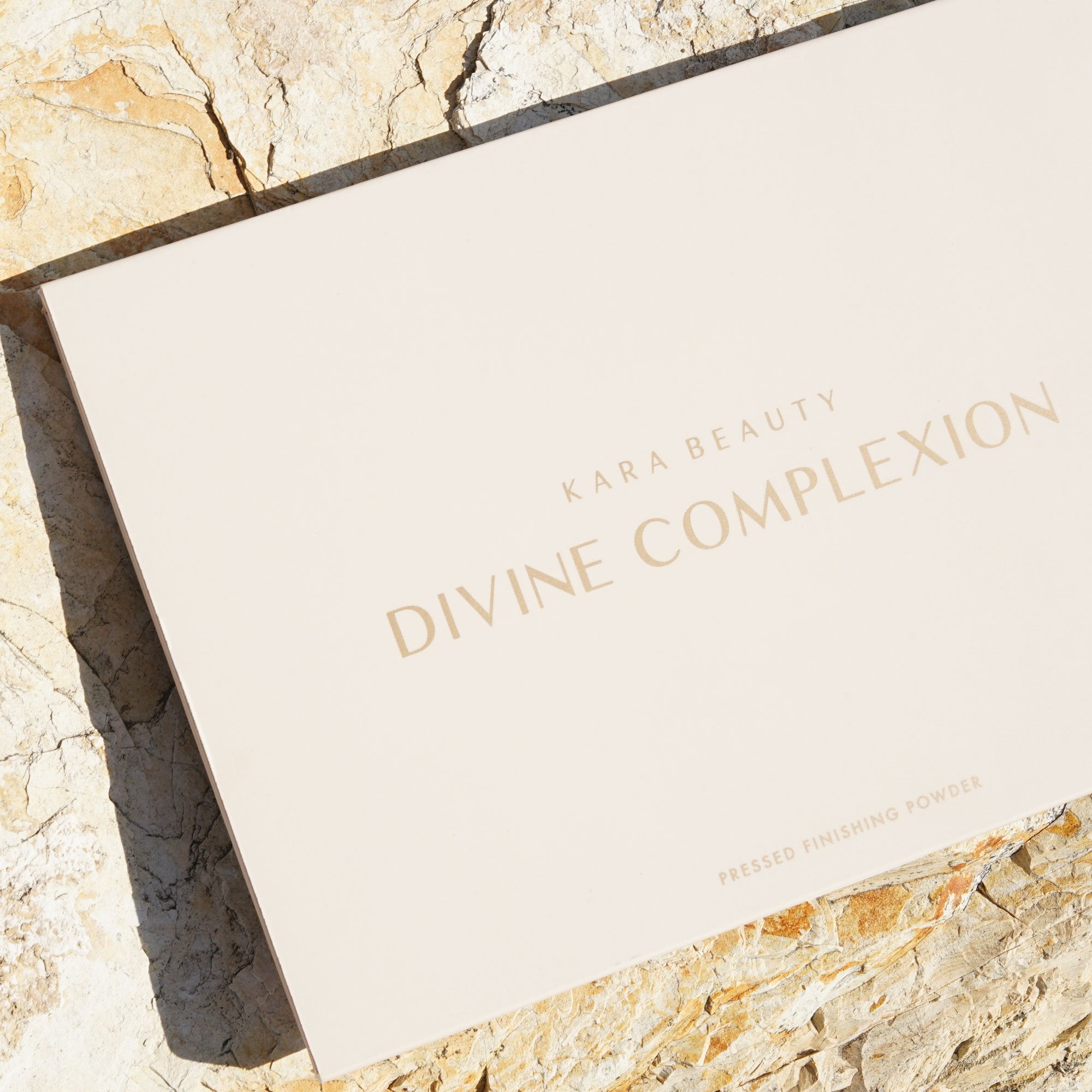 Packaging for Divine Complexion pressed finishing powder