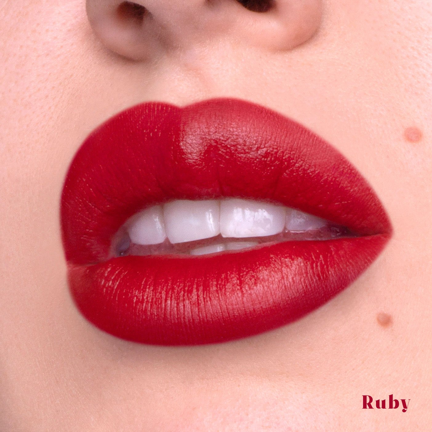 Kara Beauty's Be my Mousse matte lip tint shade Ruby on lips